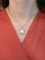 Pendentif AUGIS - Médaille amour entourage coeurs diamants or blanc rubis 58 Facettes J555