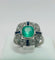 Bague 59 Bague en platine avec une émeraude, des diamants et des saphirs. 58 Facettes 50230