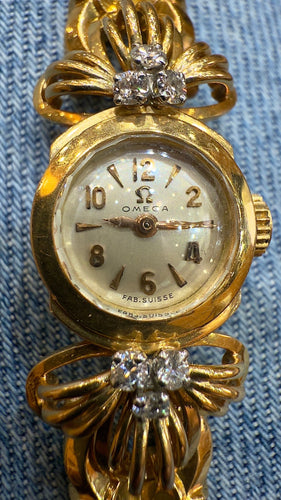 Montre Montre Omega ancienne en or  18 carats et diamants 58 Facettes