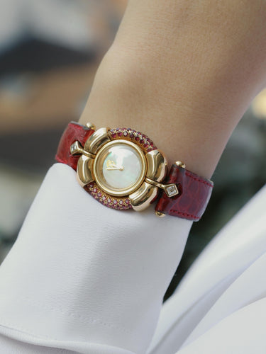 Montre RENE BOIVIN Montre Chrysalide or jaune rubis saphirs diamants 58 Facettes 1089.1