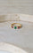 Bague 49 Bague jarretière or jaune émeraudes rubis et diamants 58 Facettes