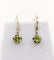 Boucles d'oreilles Dormeuses antique or jaune péridot en serti griffes 58 Facettes A05288