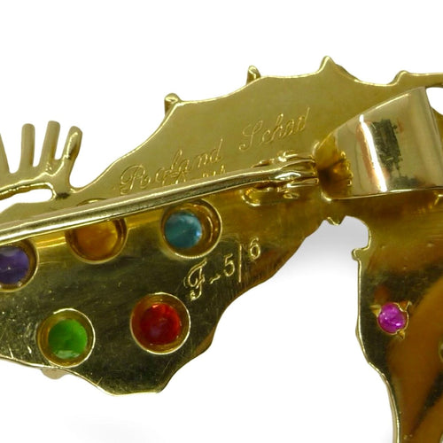 Broche Broche hippocampe or jaune Roland Schad et pierres fines 58 Facettes
