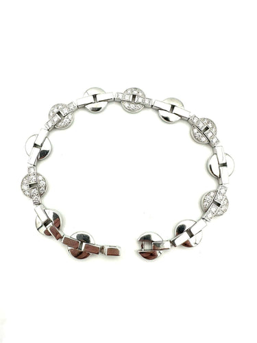 Bracelet CARTIER. Collection "Himalia", bracelet or blanc 18K et diamants 58 Facettes