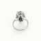 Bague 57 Bague en or blanc, diamants et émeraudes 58 Facettes CAN1416