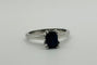 Bague Bague en or avec un saphir central 58 Facettes 50023
