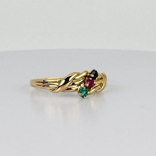 Bague Bague vintage ornée d'un rubis, d'une émeraude et d'un saphir bleu 58 Facettes 2505006