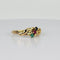 Bague Bague vintage ornée d'un rubis, d'une émeraude et d'un saphir bleu 58 Facettes 2505006