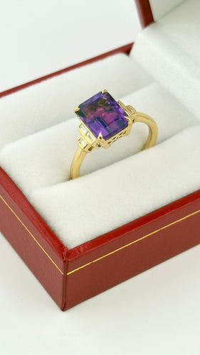 Bague Bague en or 18 carats , améthyste et diamants 58 Facettes
