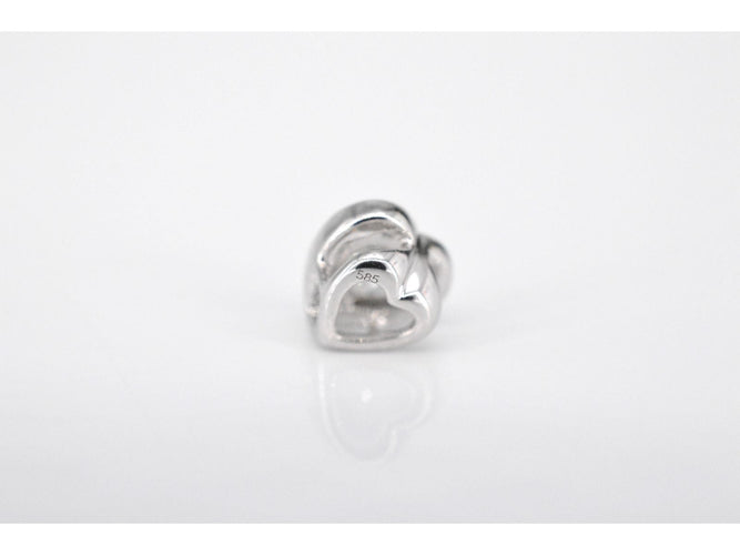 Pendentif Pendentif en or blanc avec un diamant taille brillant en forme de coeur 58 Facettes 2095