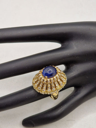 Bague Bague vintage style trombino avec diamants saphir cabochon en or jaune 18 carats 58 Facettes
