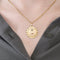 AUGIS - Médaille d'Amour en or jaune, diamant et rubis de synthèse