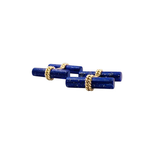 Boutons de manchette Boutons de manchette BOUCHERON, or jaune et bâtonnets de lapis lazuli. 58 Facettes 34873