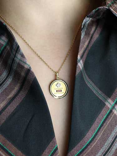 Pendentif Médaille amour AUGIS ronde Plus qu'hier moins que demain or jaune rubis diamants 58 Facettes 1102