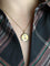 Pendentif Médaille amour AUGIS ronde Plus qu'hier moins que demain or jaune rubis diamants 58 Facettes 1102