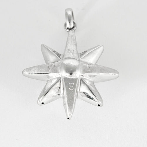 Pendentif Pendentif soleil en or gris 58 Facettes CAN1103