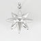 Pendentif Pendentif soleil en or gris 58 Facettes CAN1103