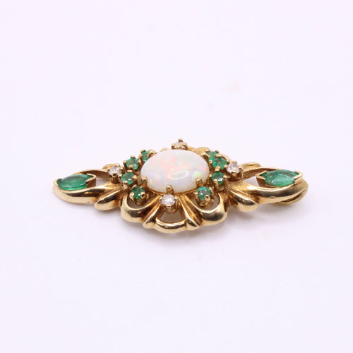 Pendentif Pendentif or jaune serti d’émeraudes, diamants et opale 58 Facettes