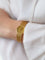 Montre BAUME & MERCIER - Montre vintage or jaune maille tressée 58 Facettes 1067.3