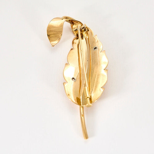 Broche Broche plume or jaune et diamant 58 Facettes SQU3218