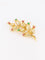Broche GUBELIN Broche feuille or rubis émeraudes 58 Facettes 1126.1