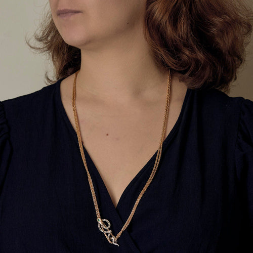 Collier Chaîne en or jaune et coulant Serpent en or gris et diamants et émeraude 58 Facettes SNA1712