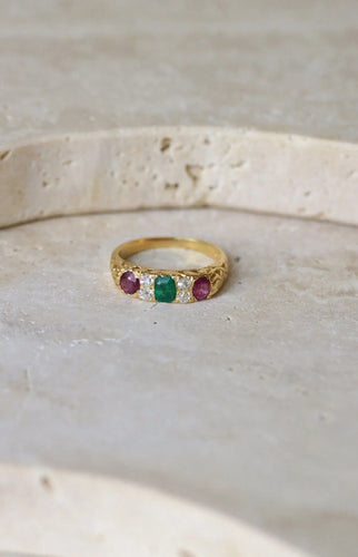 Bague 49 Bague jarretière or jaune émeraudes rubis et diamants 58 Facettes
