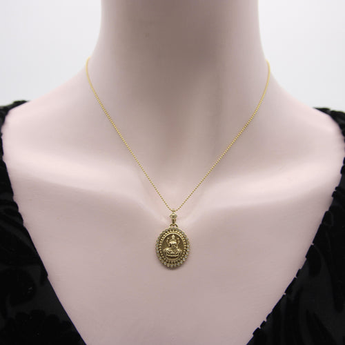 Pendentif Pendentif Orly Marcel Lakshmi en or jaune avec halo de diamants 58 Facettes A2001L