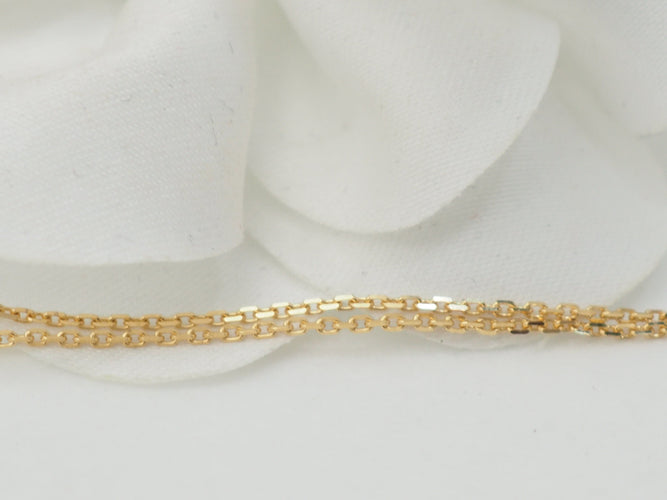 Collier Collier pendentif marguerite en or jaune et grenats 58 Facettes 33127