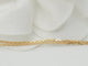 Collier Collier pendentif marguerite en or jaune et grenats 58 Facettes 33127