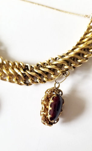 Bracelet Bracelet maille américaine or jaune 18 carats et breloques - 17 cms - 36.25 grs 58 Facettes