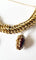 Bracelet Bracelet maille américaine or jaune 18 carats et breloques - 17 cms - 36.25 grs 58 Facettes