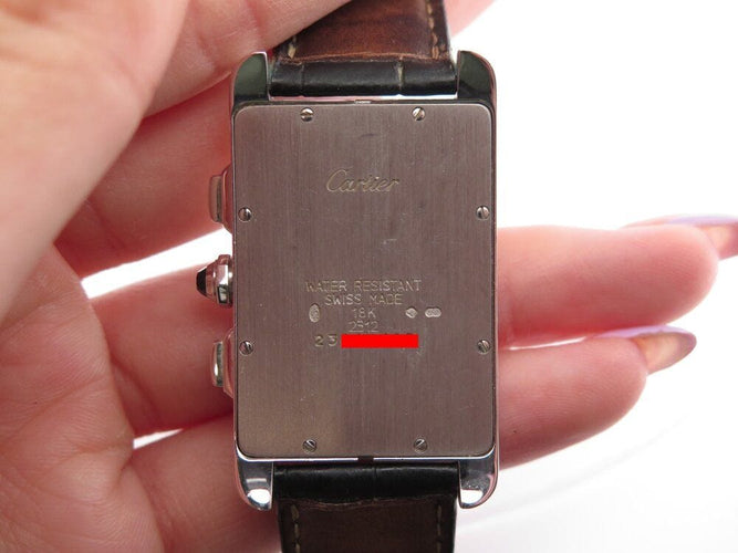 Montre montre CARTIER tank americaine en or quartz chronographe 58 Facettes 263396