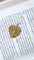 Pendentif Médaille calice et coeur trois ors 58 Facettes