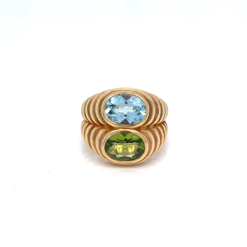 Bague 52 BULGARI - Bague Double Baccellato, or jaune avec topaze bleue et péridot, vers 1980 58 Facettes
