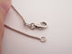 collier avec pendentif 3 diamants 0.27ct en or blanc 18k 8.5gr 58 Facettes 265667