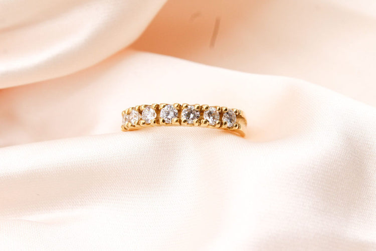 Bague Bague demi-alliance or jaune, 7 diamants 0,70 ct H SI 58 Facettes 250074