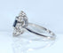 Bague 53 Bague marguerite en or blanc, saphir et diamants 58 Facettes AB644