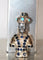 Broche Moretto Blackamoor broche or jaune 18k saphirs turquoises 58 Facettes 377