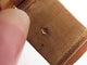 Montre vintage montre baume & mercier tank 37077 mecanique or 18k & oeil de tigre 58 Facettes 268283