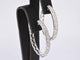 Boucles d'oreilles Boucles d'oreilles créoles en or blanc avec diamants 58 Facettes 2052