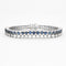 Bracelet Bracelet tennis double, or blanc, diamants et saphirs 58 Facettes 240453