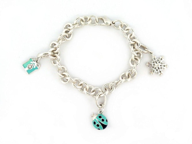 Bracelet bracelet TIFFANY & CO chaine a breloques charms argent 58 Facettes 259368