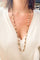 Collier Sautoir en perles d'or ciselés et perle yeux de tigre 58 Facettes 1