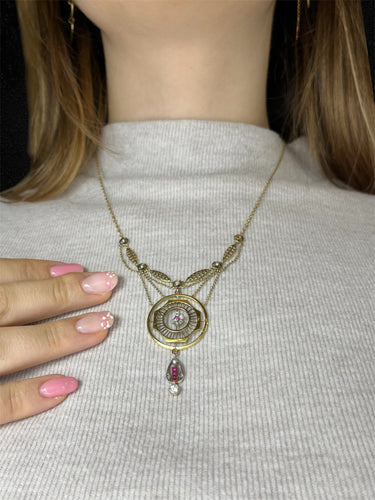 Collier Raro collier in stile Jugendstil realizzato in oro, arricchito da diamanti e rubini. 58 Facettes