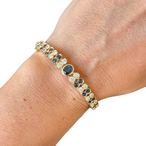 Bracelet Jonc or jaune, Serti de Saphirs et Diamants 58 Facettes 339