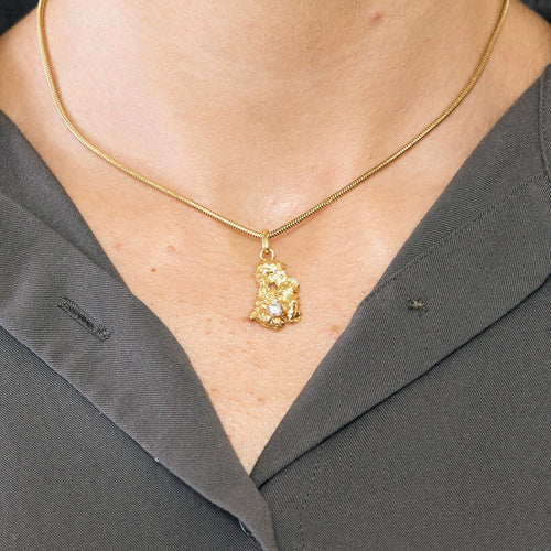 Collier Collier or jaune maille serpent et pépite d'or 58 Facettes ALE4276
