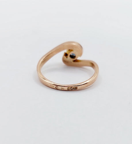 Bague 48 Bague tourbillon or jaune ornée d'un saphir (circa 1920) 58 Facettes A05082