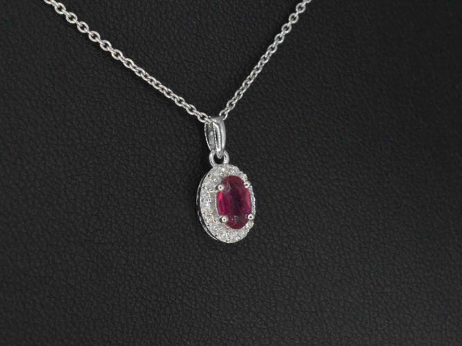 Pendentif Pendentif en or blanc serti de diamants et de rubis 58 Facettes 2017