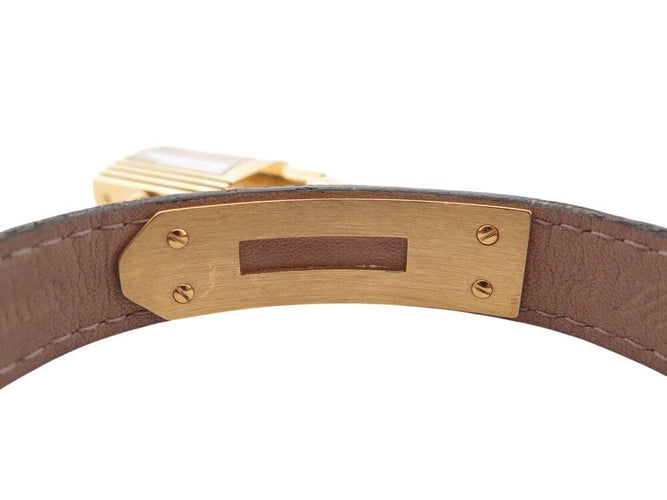 Montre montre vintage HERMES Kelly Mini Cadenas 20 mm plaque or quartz dame 58 Facettes 268902